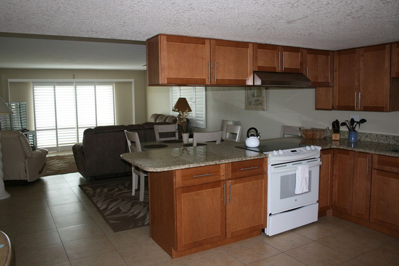 kitchen with painted wood colored cabinets
