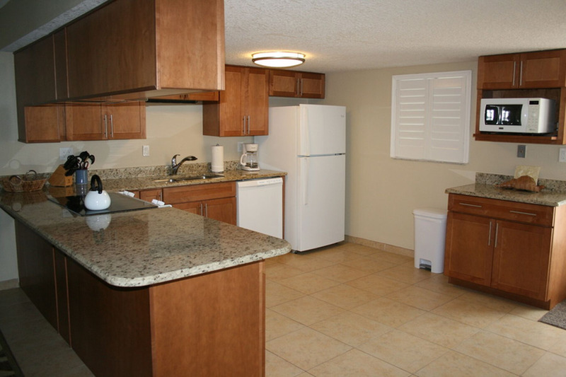 kitchen with refrigerator, dishwasher and microwave