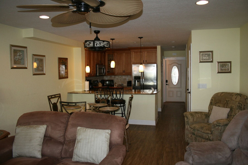 yellow and black furnished dining table and kitchen