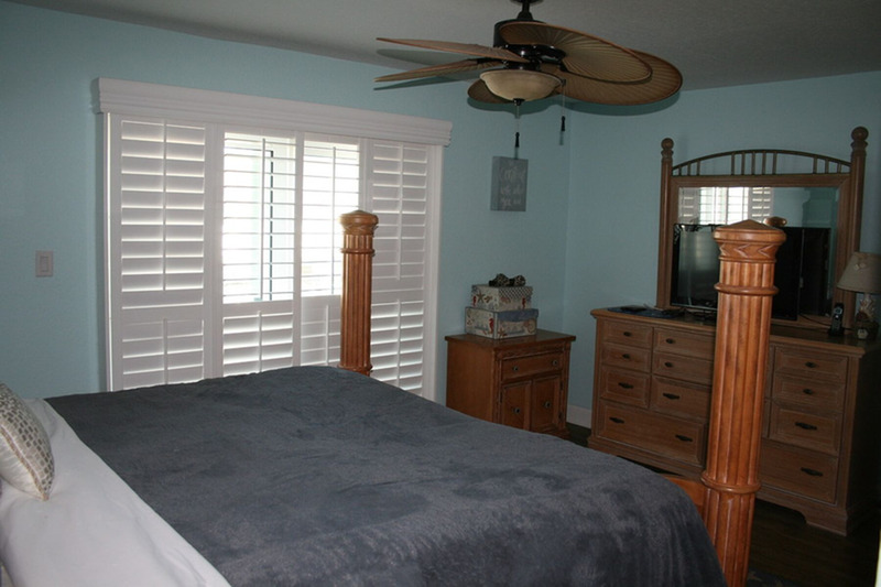 large bed in a blue room