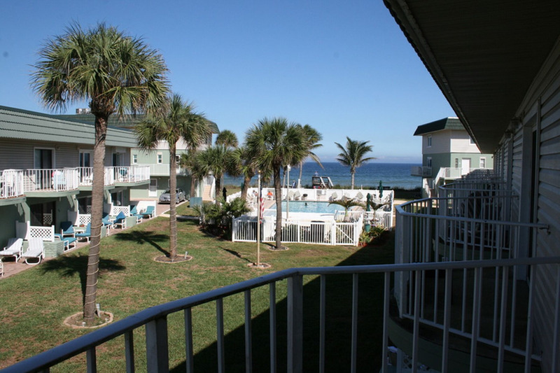 view of the pool and ocean from the balcony on the second floor