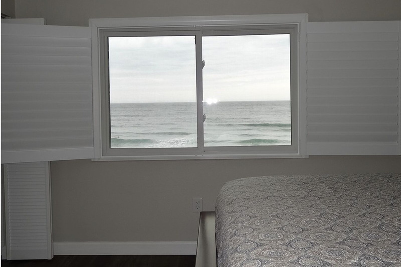 ocean view from inside a master bedroom