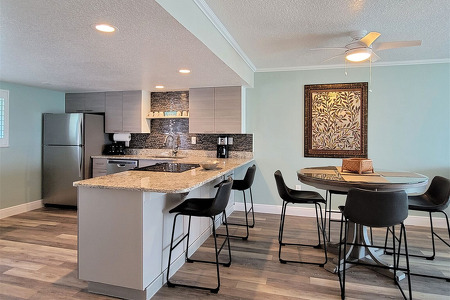 Kitchen island, granite counters, and extra seating