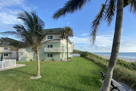 image taken between the beach and living buildings