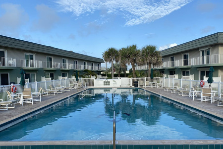 picture featuring the large rectangular pool of villa riviera