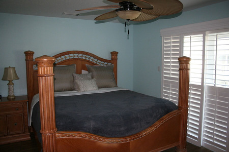 king size bed in a blue room