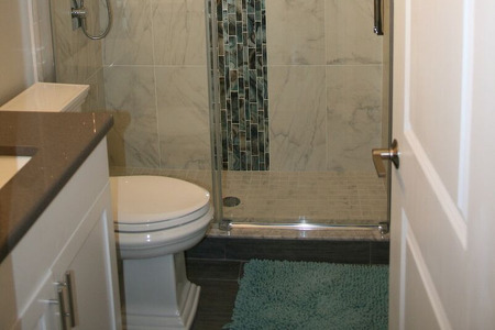 bathroom with a walk in shower