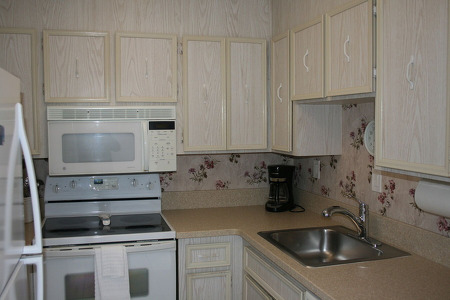 beige kitchen and cabinets