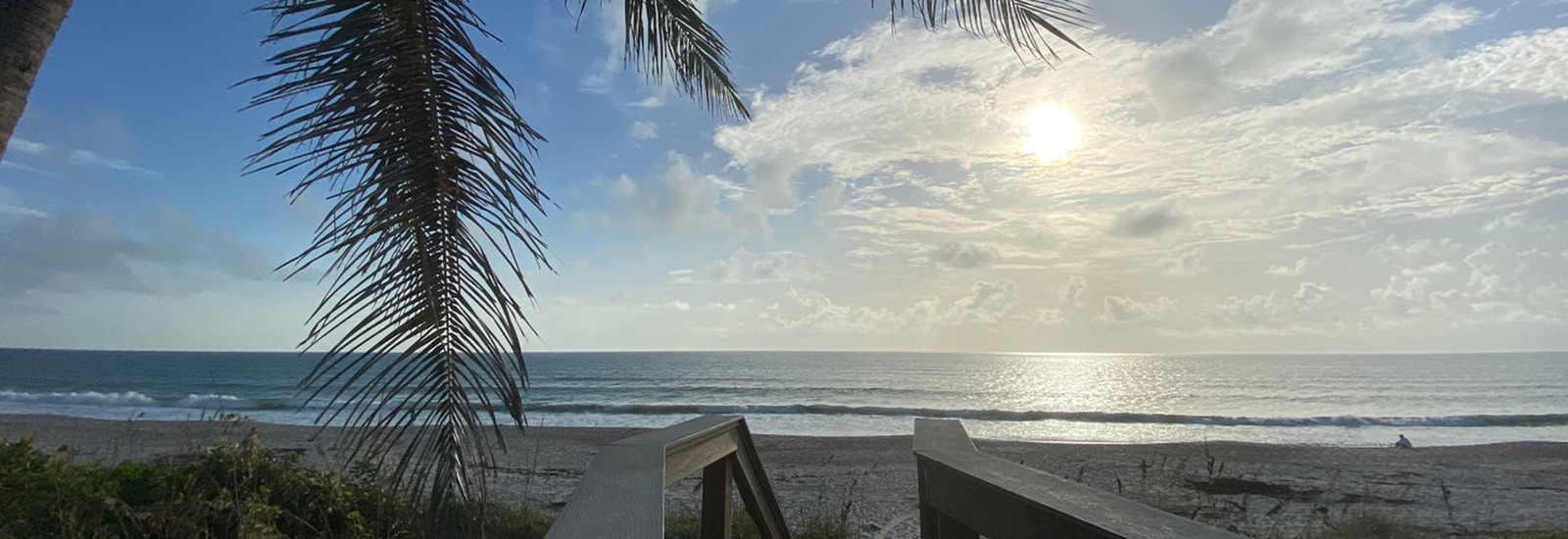 view of atlantic ocean from villa walkway to beach